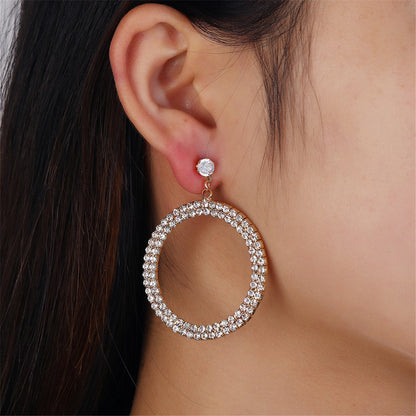 Cubic Zirconia and 18K Gold-Plated Pav¨¦ Circle Drop Earrings, gold drop earrings for women, botanical inspired, front view