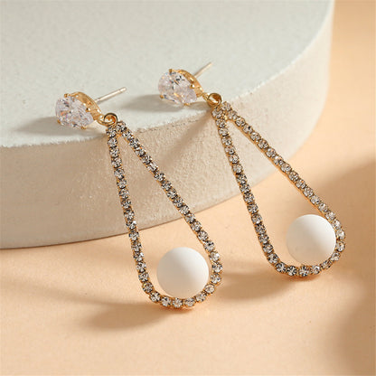Crystal and Cubic Zirconia Teardrop Earrings, drop earrings for women, dainty minimalist design, side view