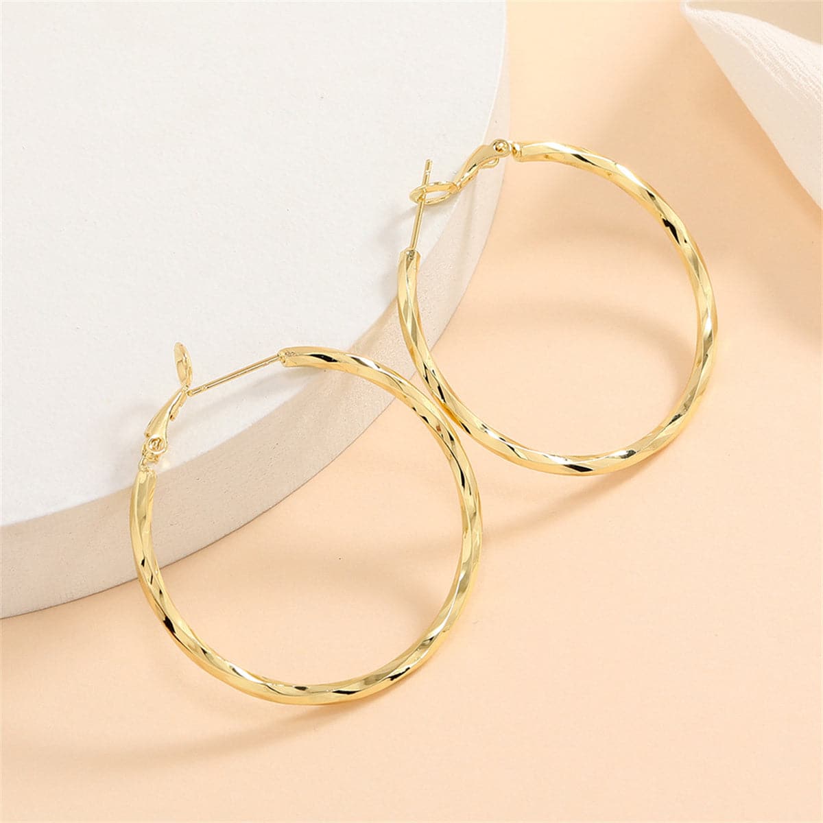 18K Gold-Plated Twisted Hoop Earrings, botanical inspired, detail close-up