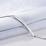 Silvertone Curved Bar Bracelet