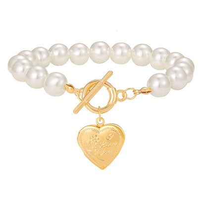 Pearl and 18K Gold-Plated Heart Charm Toggle Bracelet, gold bracelet for women, dainty minimalist design, front view