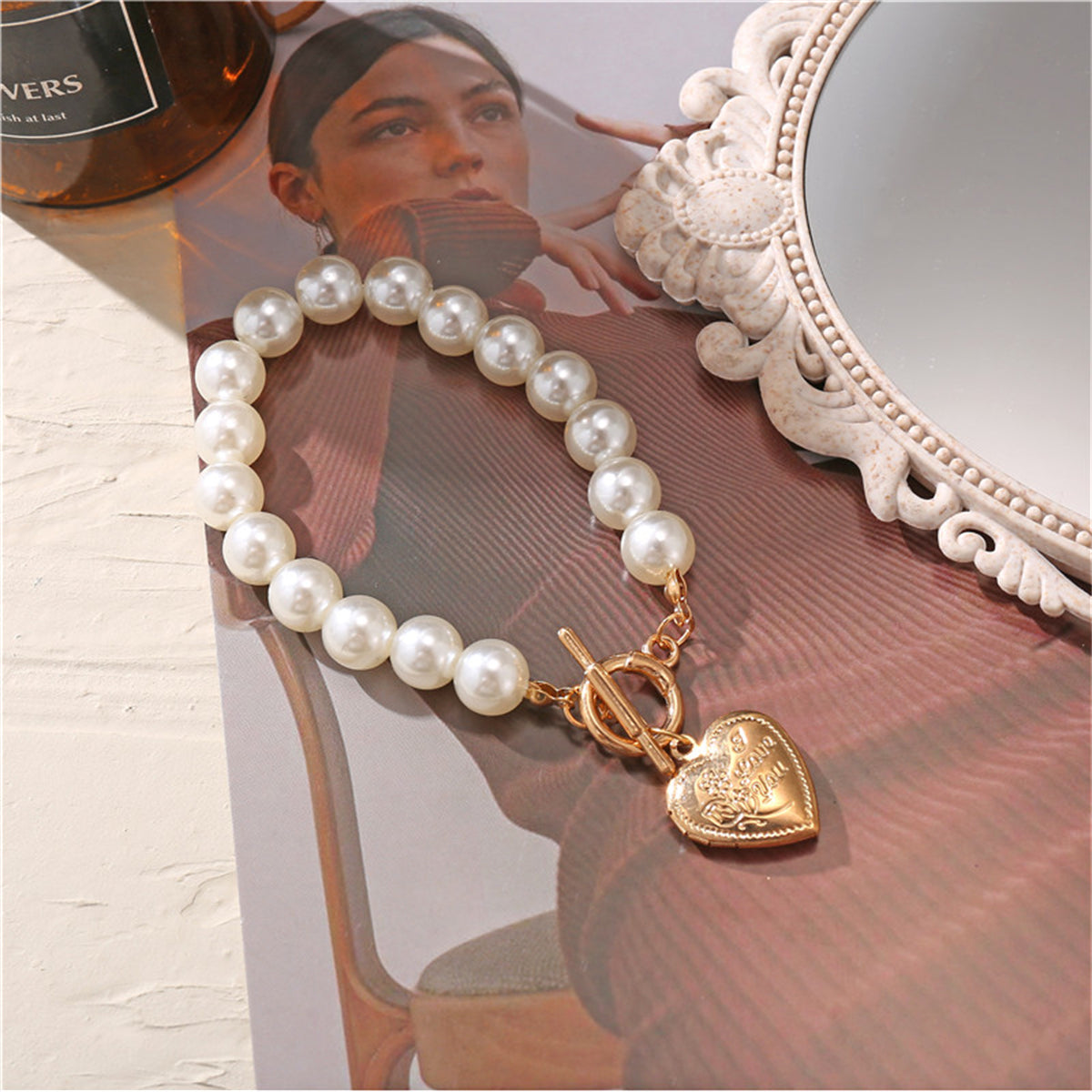 Pearl and 18K Gold-Plated Heart Charm Toggle Bracelet, gold bracelet for women, dainty minimalist design, side view