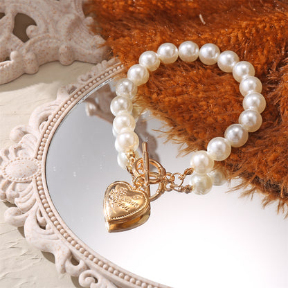 Pearl and 18K Gold-Plated Heart Charm Toggle Bracelet, gold bracelet for women, dainty minimalist design, lifestyle look