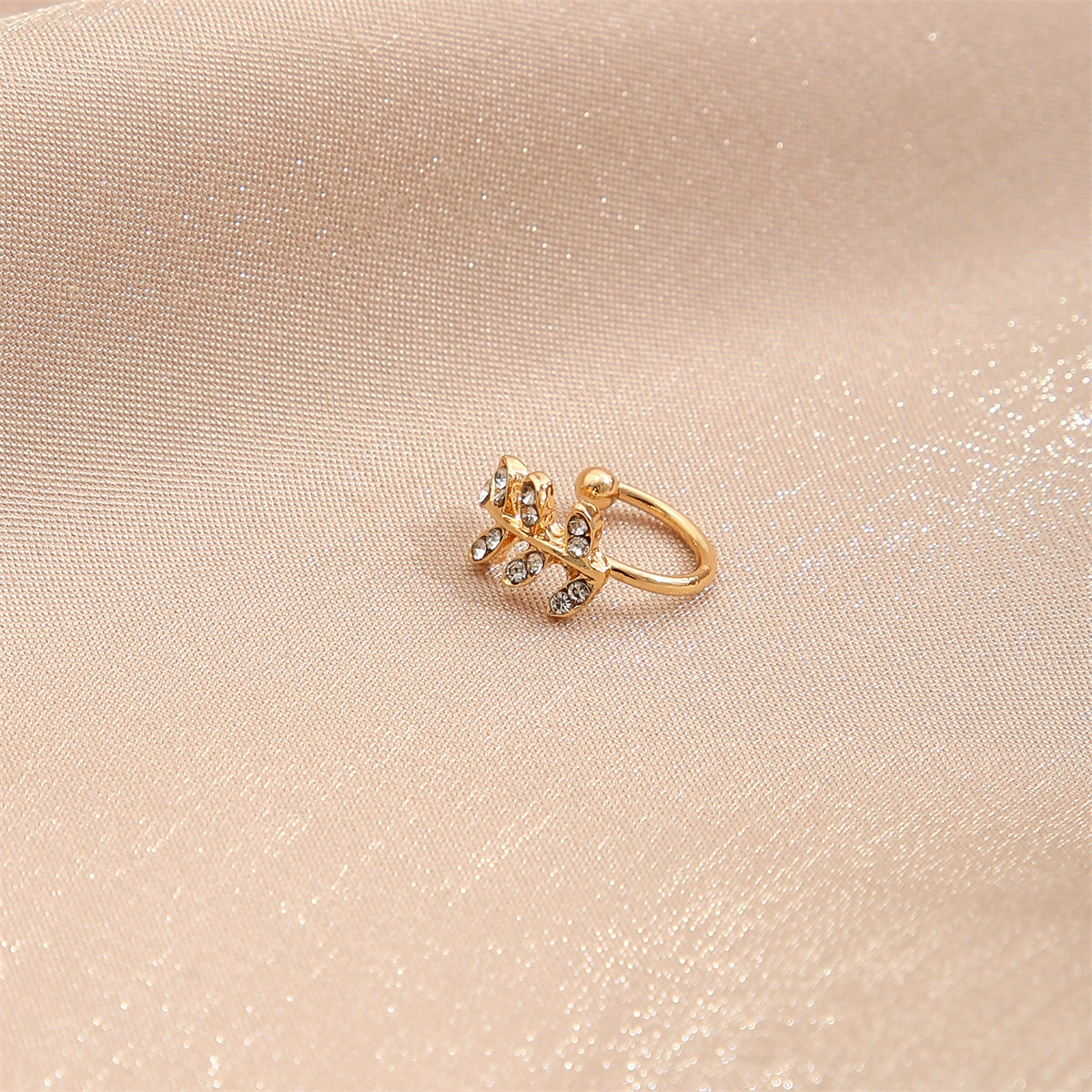 Cubic Zirconia and 18K Gold-Plated Leaves Ear Cuff, gold stud earrings for women, dainty minimalist design, lifestyle look