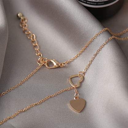 18K Gold-Plated Heart Lariat Necklace, gold pendant necklace for women, botanical inspired, detail close-up