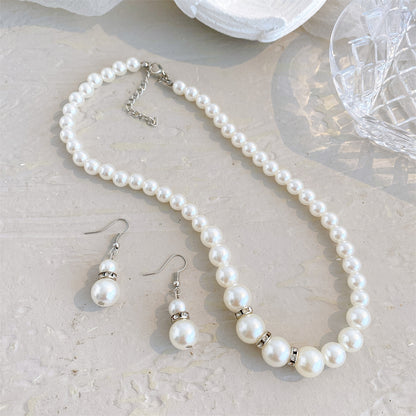 Pearl and Cubic Zirconia Beaded Necklace and Drop Earrings, drop earrings for women, vintage-inspired design, styled look