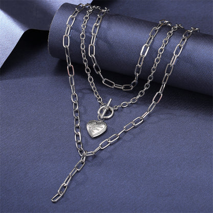 Silver-Plated Heart Toggle Layered Lariat Necklace, silver pendant necklace for women, everyday style, detail close-up