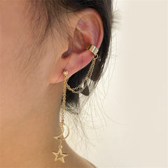 Elegant gold ear cuff featuring a star and moon charm, perfect for adding a celestial touch to your style.