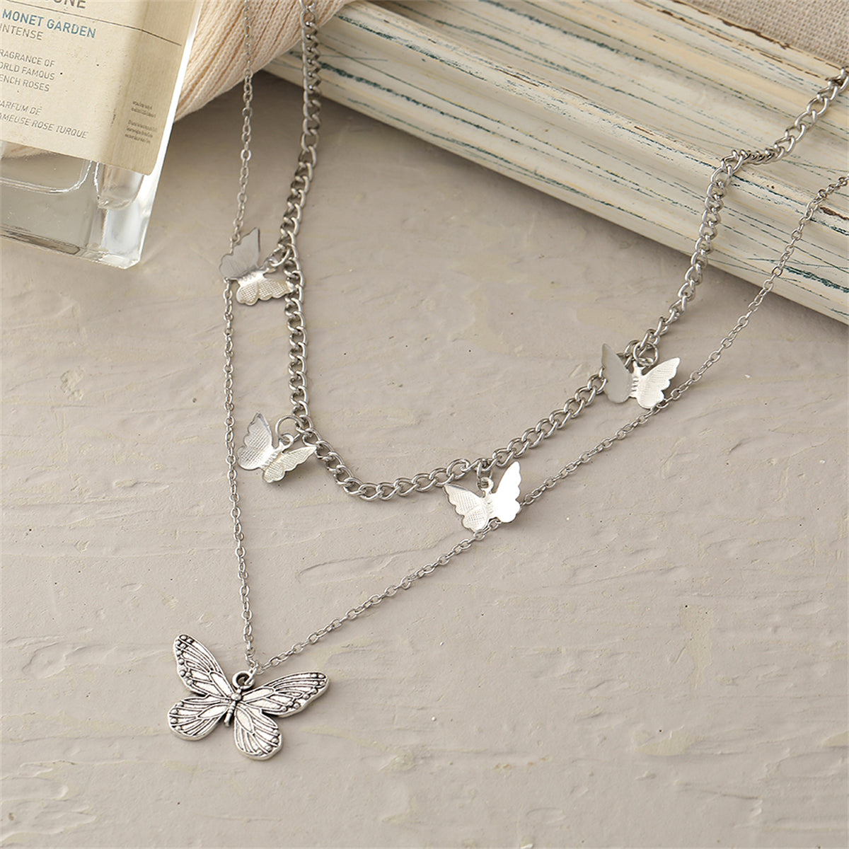 Silver-Plated Layered Butterfly Station Necklace, silver pendant necklace for women, botanical inspired, lifestyle look
