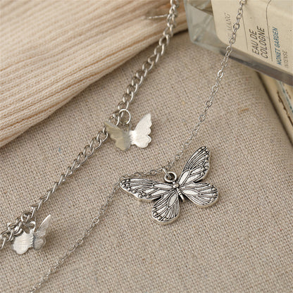 Silver-Plated Layered Butterfly Station Necklace, silver pendant necklace for women, botanical inspired, detail close-up