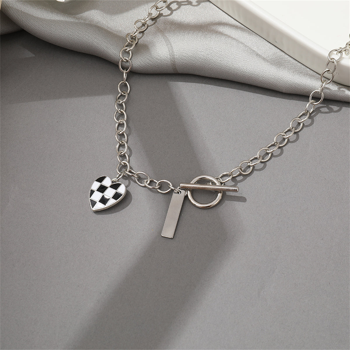 Black Enamel and Silver-Plated Checkerboard Heart Toggle Necklace, silver pendant necklace for women, side view