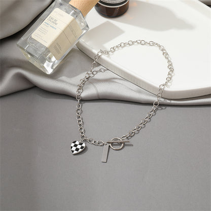Black Enamel and Silver-Plated Checkerboard Heart Toggle Necklace, silver pendant necklace for women, detail close-up