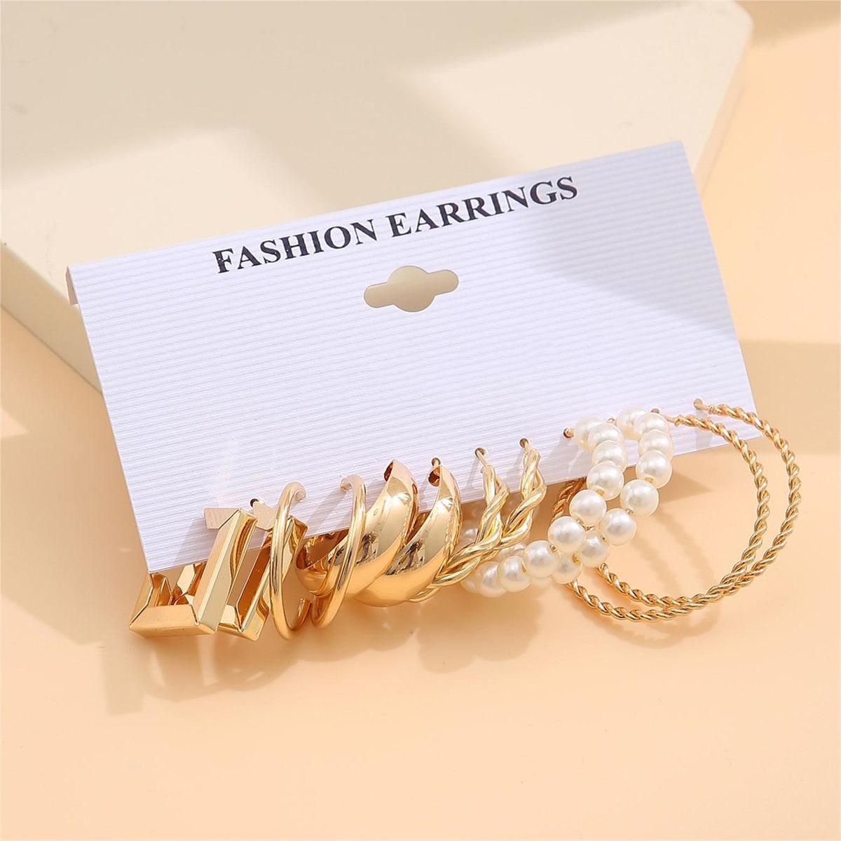 Pearl and 18K Gold-Plated Hoop Earrings Set, gold huggie earrings, dainty minimalist design, side view