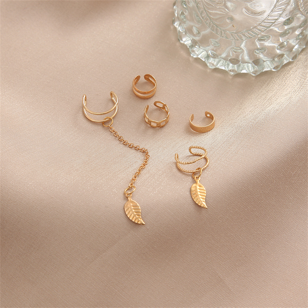 18K Gold-Plated Leaves Ear Cuff Set, gold stud earrings for women, botanical inspired, detail close-up