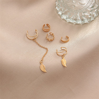 18K Gold-Plated Leaves Ear Cuff Set, gold stud earrings for women, botanical inspired, detail close-up