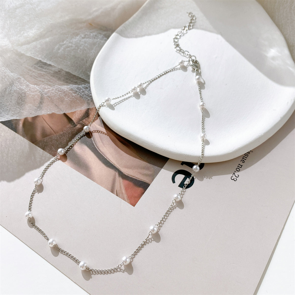 Pearl and Silver-Plated Station Chain Necklace, silver pendant necklace for women, botanical inspired, side view