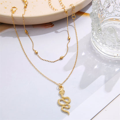 18K Gold-Plated Station Anklet and Snake Charm Anklet, jewelry gift sets for women, botanical inspired, detail close-up