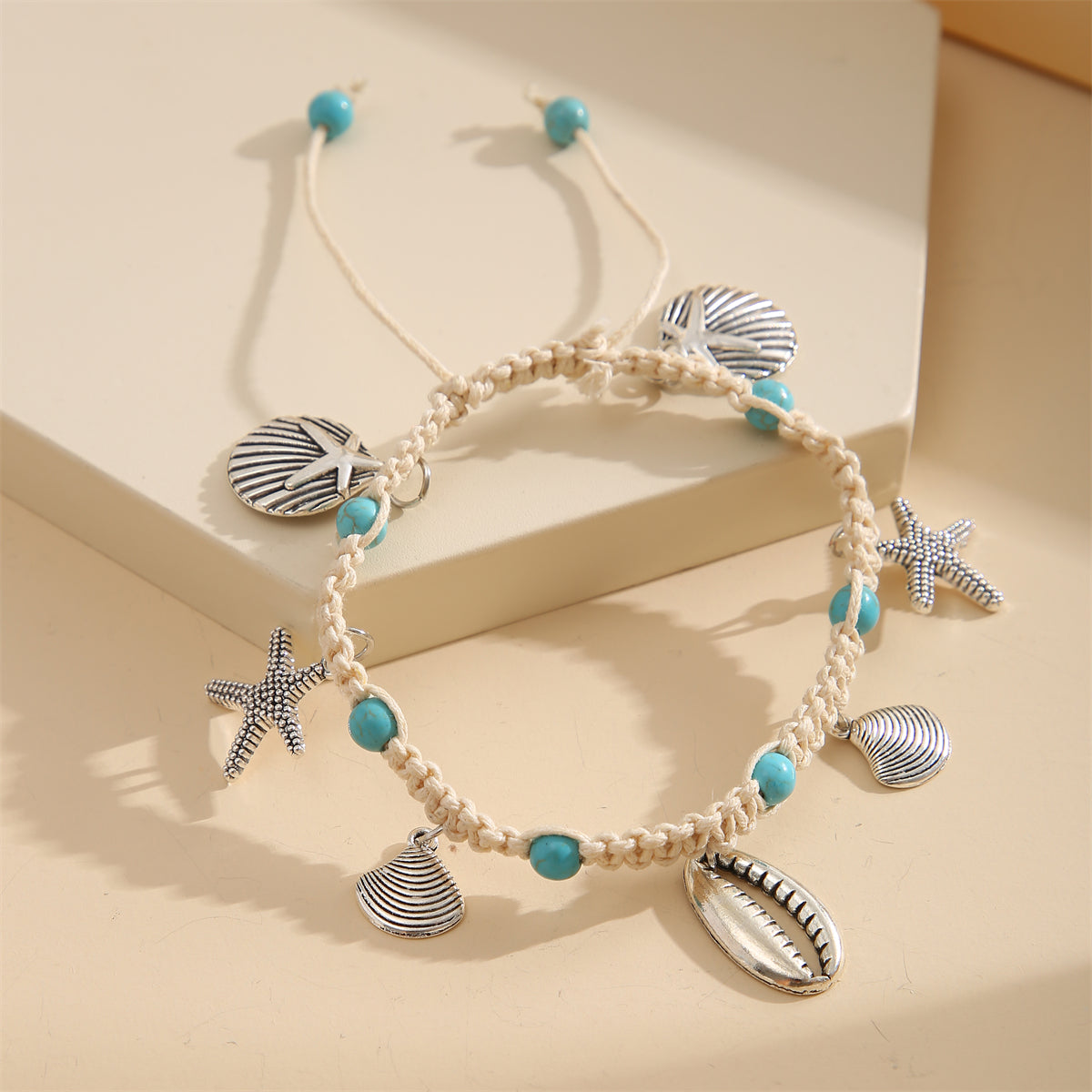 Turquoise and Silver-Plated Sea Charm Anklet, silver anklet bracelet, botanical inspired, side view