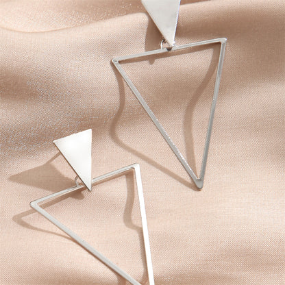 Silver-Plated Open Triangle Drop Earrings, silver drop earrings for women, vintage-inspired design, lifestyle look