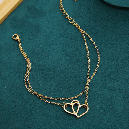 18K Gold-Plated Interlocked Heart Layered Chain Anklet, gold anklet bracelet, vintage-inspired design, lifestyle look