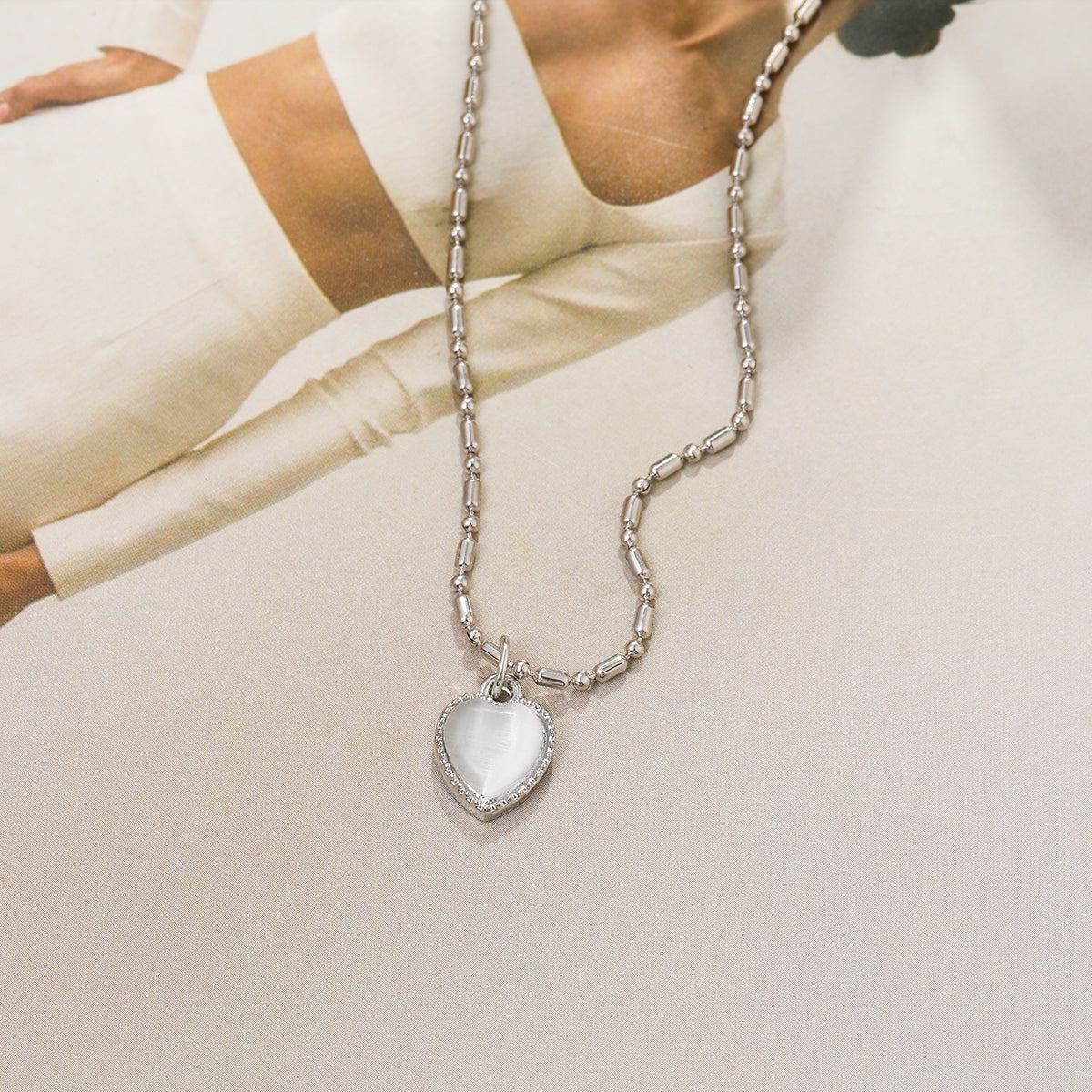 Moonstone and Silver-Plated Heart Pendant Necklace, silver pendant necklace for women, botanical inspired, side view