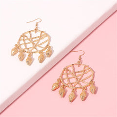 Beautifully crafted 18K gold-plated dream catcher earrings, showcasing a unique conch web design for a chic accessory.