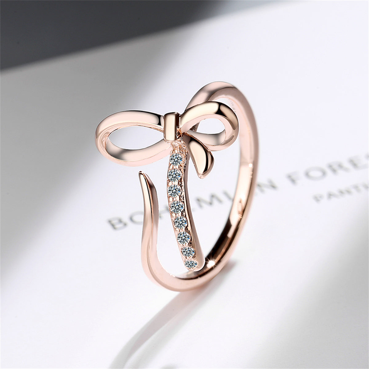 Cubic Zirconia and 18K Rose Gold-Plated Pavé Openwork Bow Bypass Ring, rose gold statement rings for women, side view