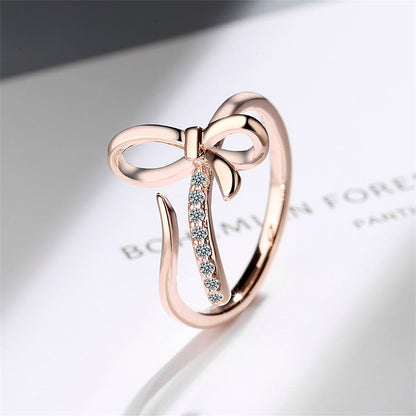 Cubic Zirconia and 18K Rose Gold-Plated Pavé Openwork Bow Bypass Ring, rose gold statement rings for women, side view