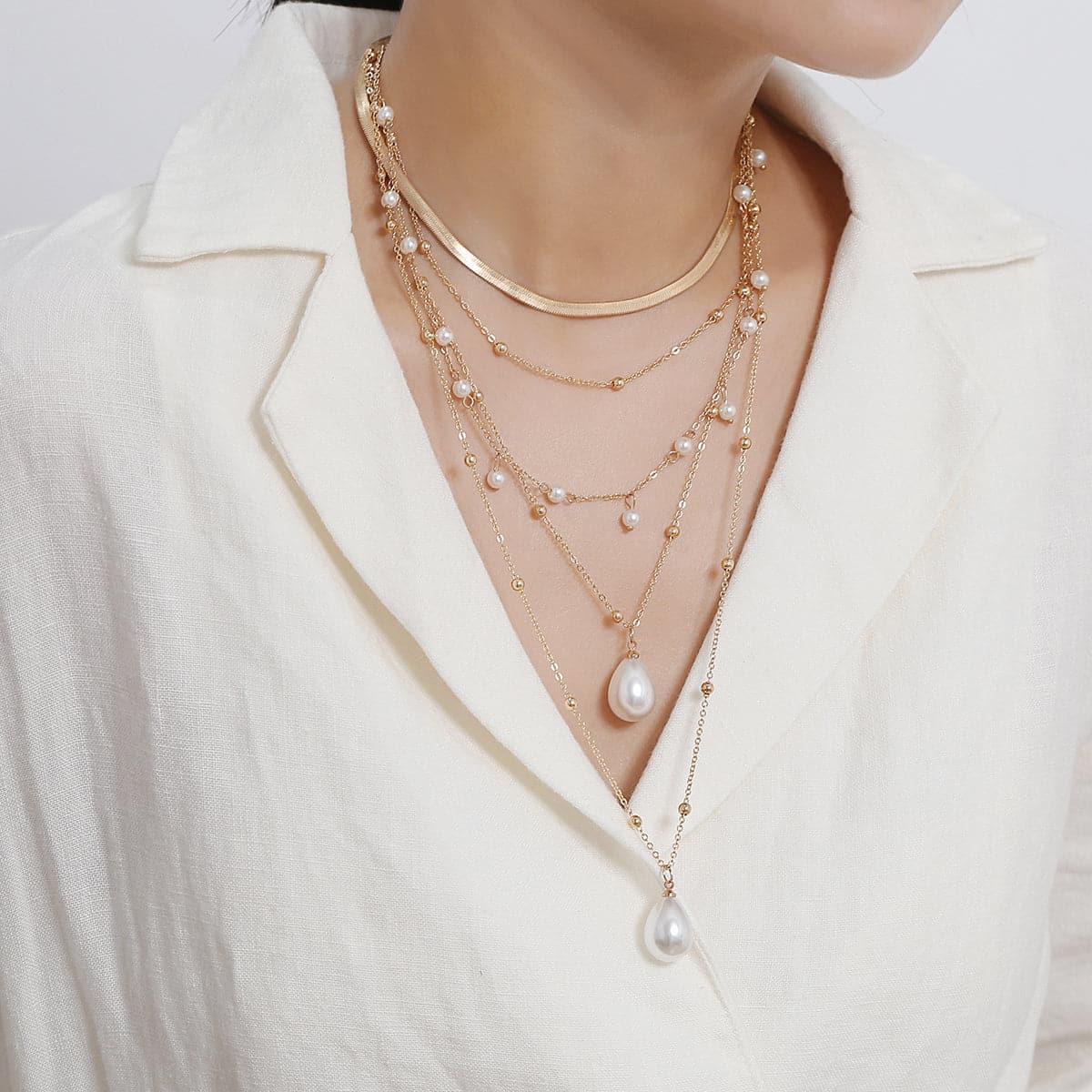 Pearl and 18K Gold-Plated Layered Necklace, gold pendant necklace for women, dainty minimalist design, lifestyle look