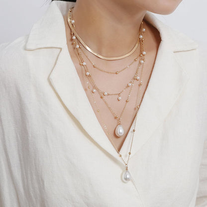Pearl and 18K Gold-Plated Layered Necklace, gold pendant necklace for women, dainty minimalist design, lifestyle look