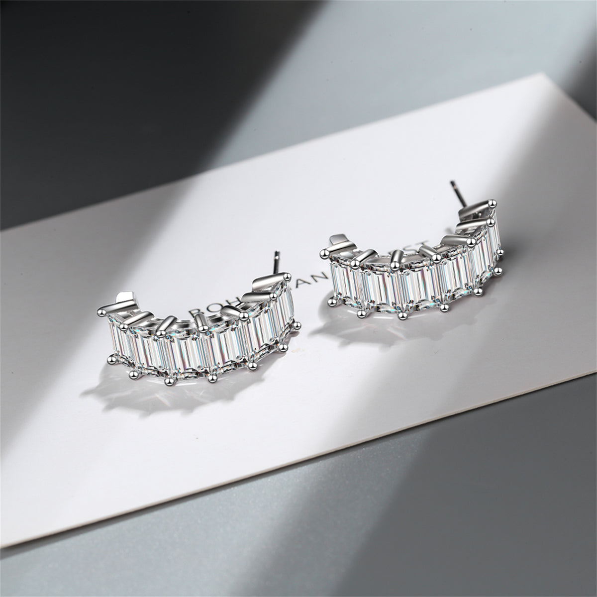 Crystal and Silver-Plated Huggie Earrings, silver huggie earrings, everyday style, side view