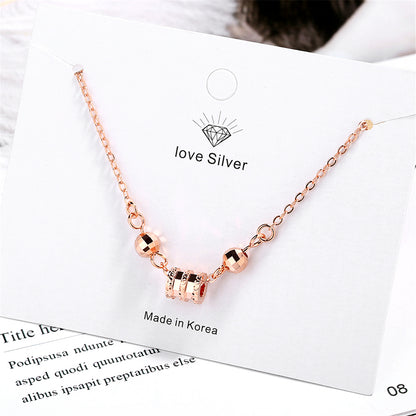 Cubic Zirconia and 18K Rose Gold-Plated Cylinder Charm Bracelet, rose gold bracelet for women, detail close-up