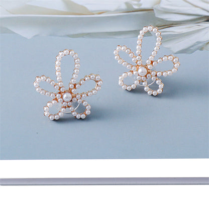 Pearl and 18K Gold-Plated Open Flower Stud Earrings, gold stud earrings for women, vintage-inspired design, side view