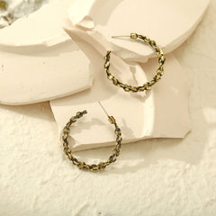 Stunning 18K gold-plated abstract textured hoop earrings featuring a chic chain, ideal for elevating your jewelry collection.