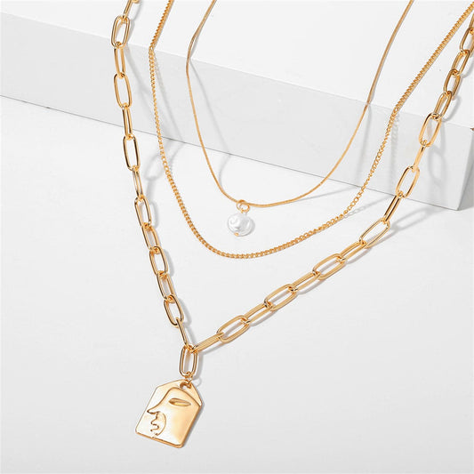 Pearl and 18K Gold-Plated Embossed Face Pendant Necklace, gold pendant necklace for women, elegant gift for her, front view