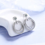 Cubic Zirconia & Silvertone Triple Circle Drop Earrings