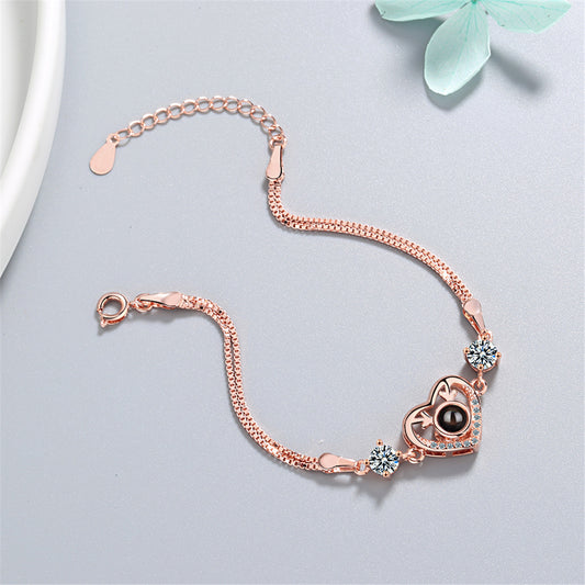 Cubic Zirconia and 18K Rose Gold-Plated Heart Charm Bracelet, rose gold bracelet for women, botanical inspired, front view