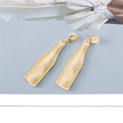 Cubic Zirconia and Pearl Wine Bottle Drop Earrings, drop earrings for women, botanical inspired, detail close-up