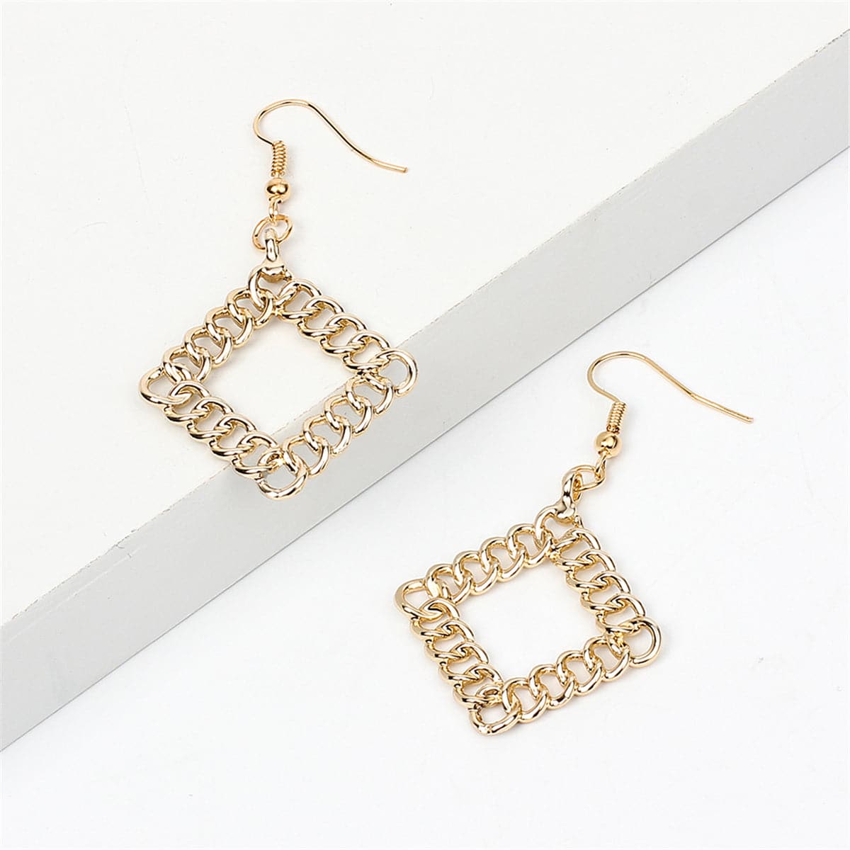Chic 18K gold-plated drop earrings in a square shape, offering a stylish touch to your jewelry collection.
