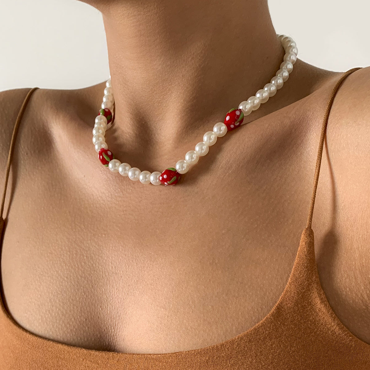 Red Acrylic and Pearl Strawberry Beaded Choker Necklace, pendant necklace for women, dainty minimalist design, side view