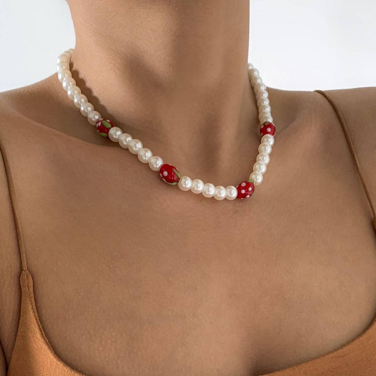 Red Acrylic and Pearl Strawberry Beaded Choker Necklace, pendant necklace for women, dainty minimalist design, lifestyle look