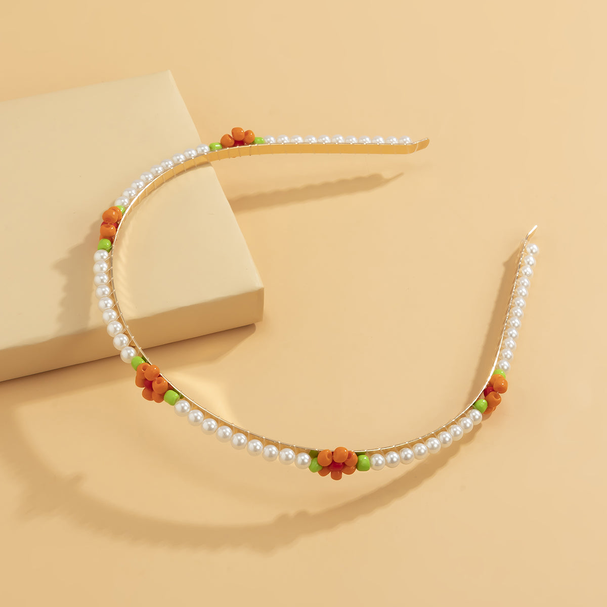 Orange Howlite and Pearl Mum Station Headband, dainty minimalist design, side view