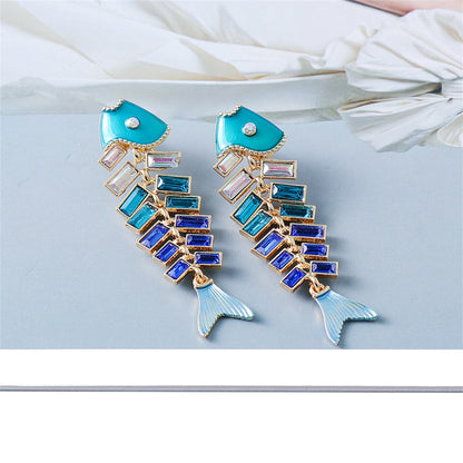 Blue Enamel and Crystal Fish Bone Drop Earrings, drop earrings for women, vintage-inspired design, detail close-up
