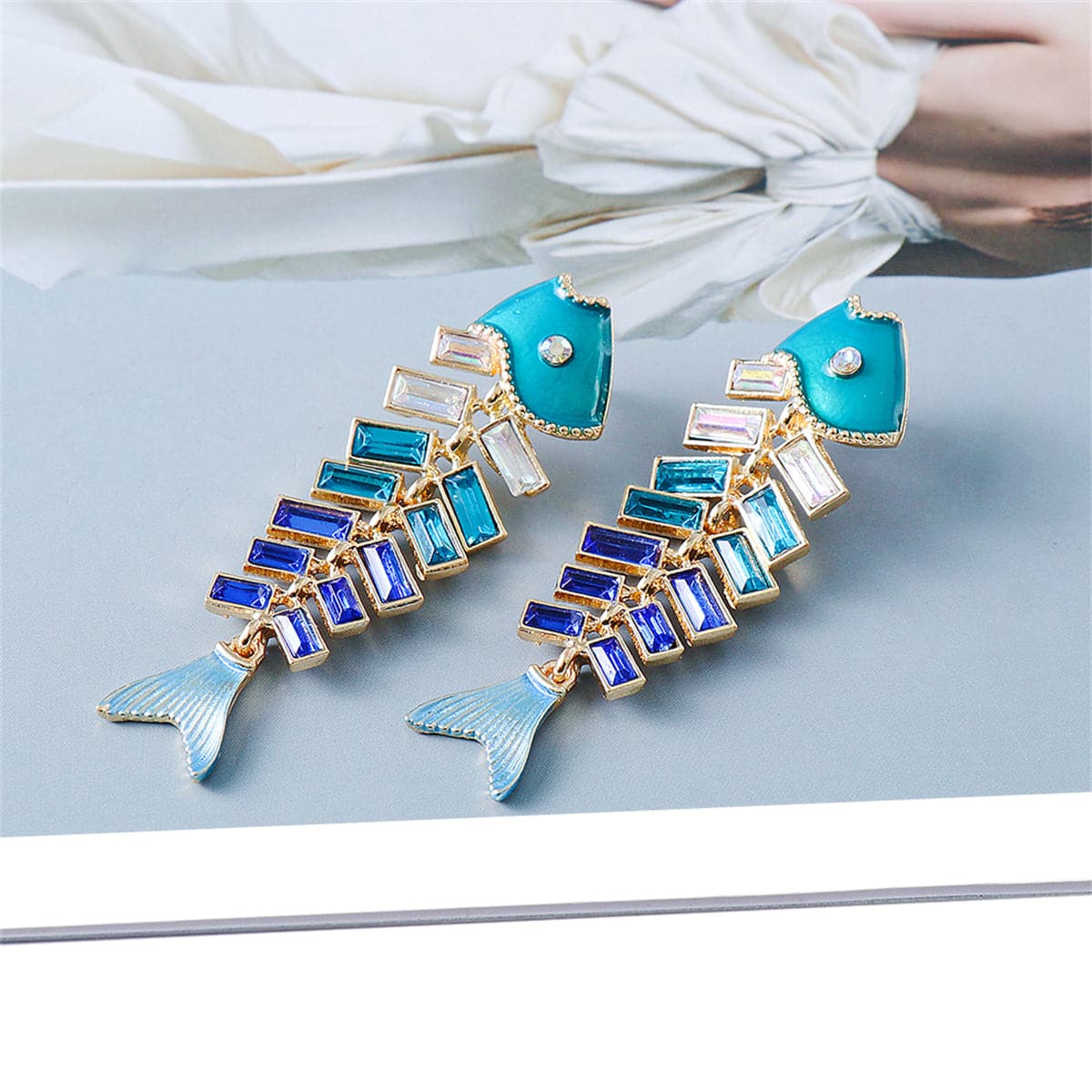 Blue Enamel and Crystal Fish Bone Drop Earrings, drop earrings for women, vintage-inspired design, lifestyle look