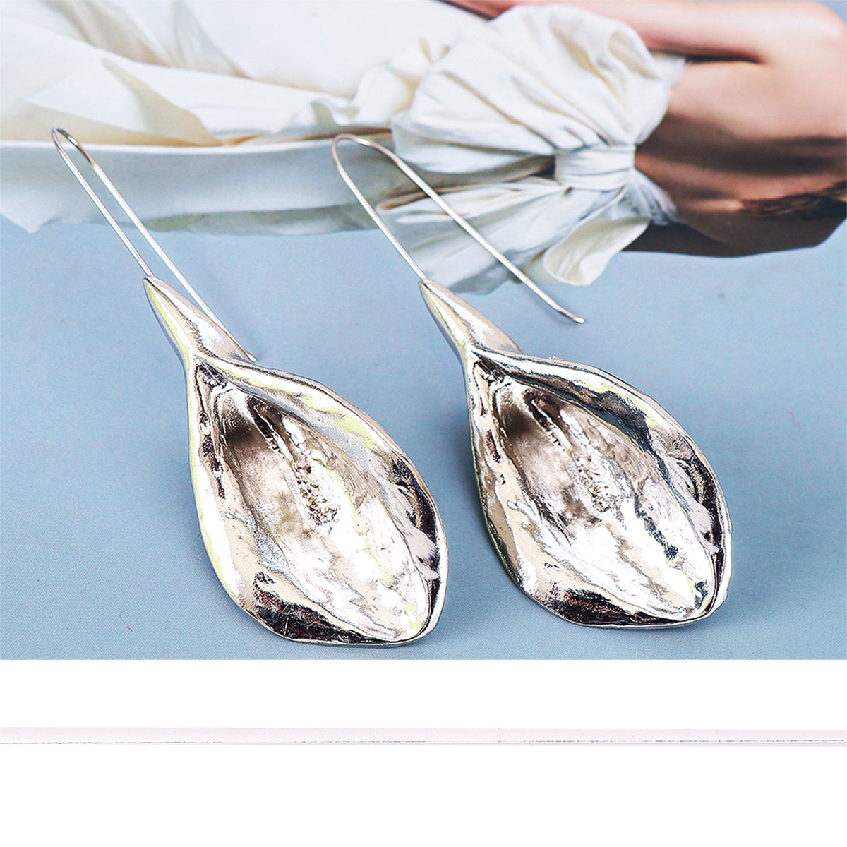 Silver-Plated Leaf Drop Earrings, silver drop earrings for women, botanical inspired, side view