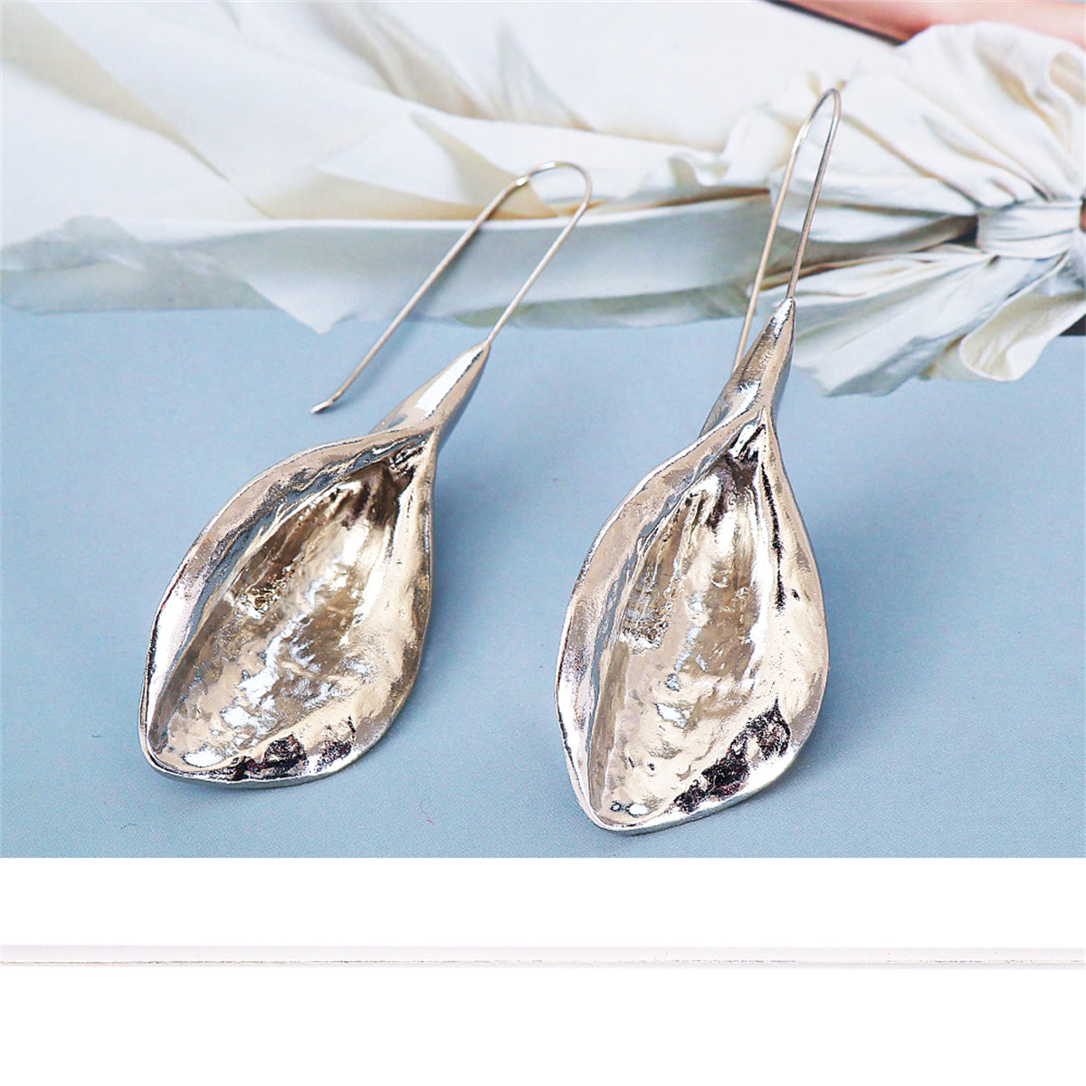 Silver-Plated Leaf Drop Earrings, silver drop earrings for women, botanical inspired, detail close-up