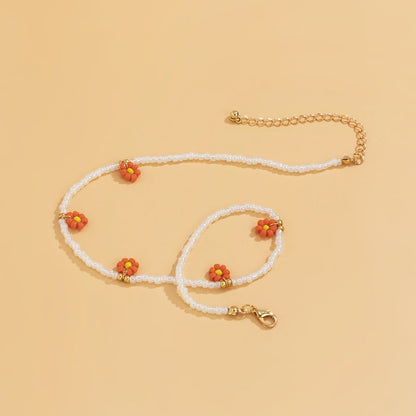 Orange Howlite and 18K Gold-Plated Mum Choker Necklace, gold pendant necklace for women, vintage-inspired design, styled look