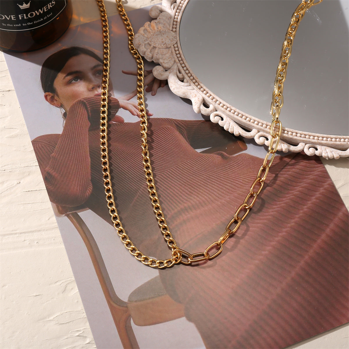 Fashionable 18K gold-plated necklace with a long chain and linked design, ideal for adding flair to your jewelry collection.