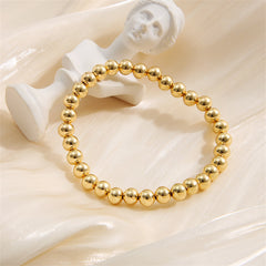 Beautifully crafted 18K gold-plated stretch bracelet showcasing a single strand of luxurious gold beads.