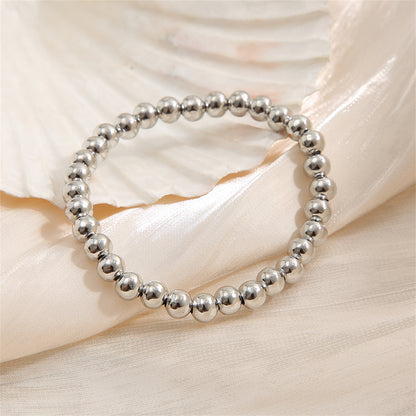 Silver-Plated Beaded Stretch Bracelet, silver bracelet for women, dainty minimalist design, lifestyle look